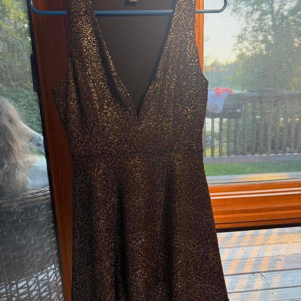 Rue 21 black & silver glittery mini dress in a S